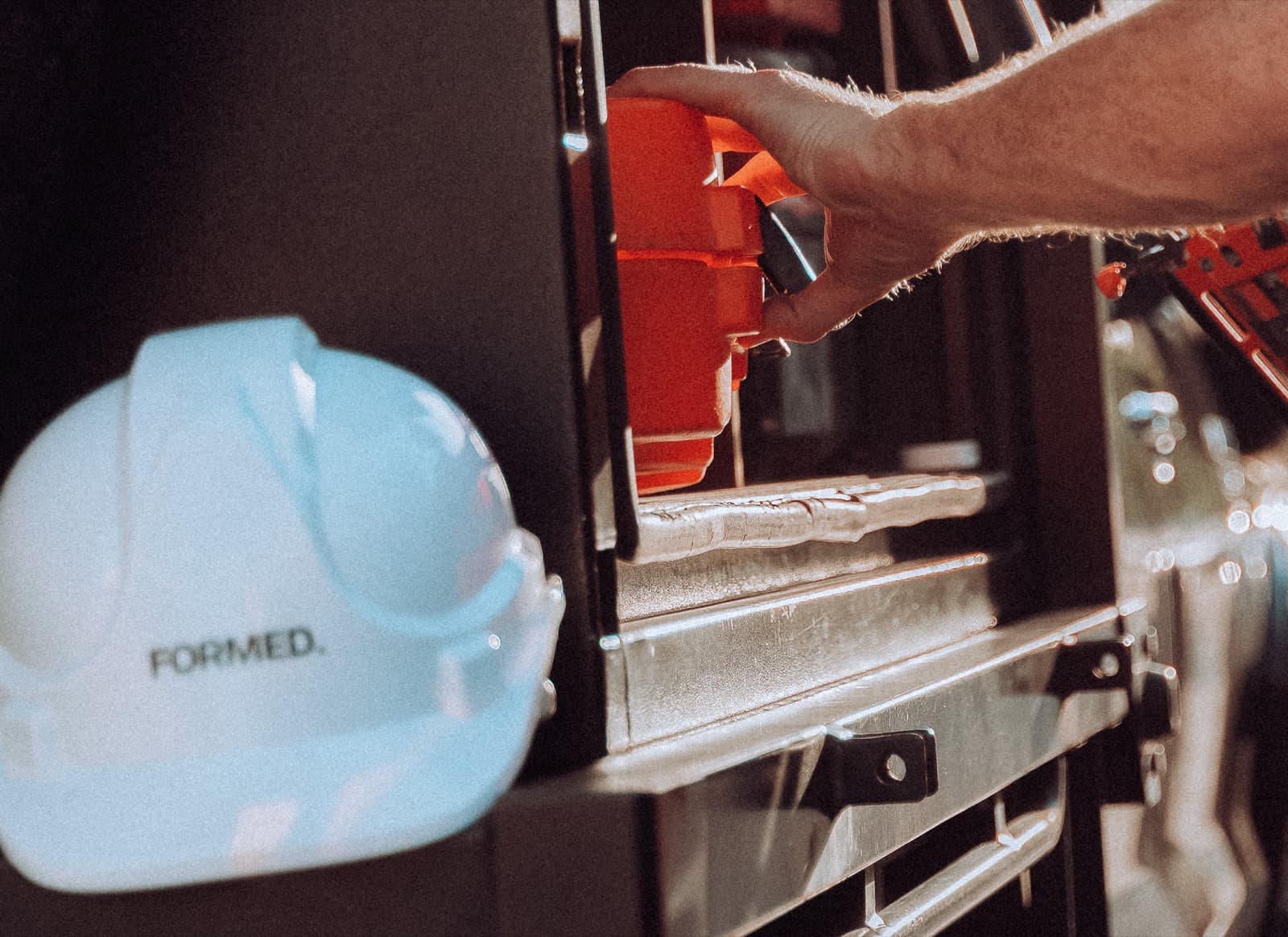 Close-up of carpenter's hands working with precision tools